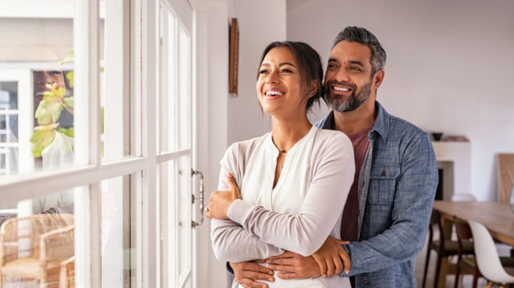 mortgage protection image happy couple at home